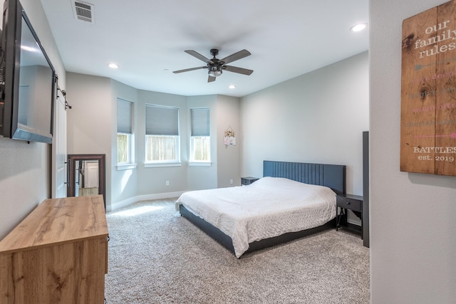 carpeted bedroom featuring ceiling fan