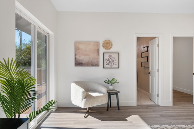 sitting room with light hardwood / wood-style floors