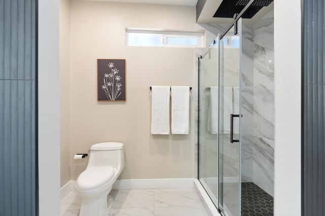 bathroom with toilet and an enclosed shower