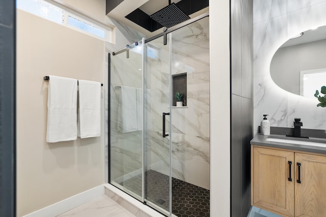 bathroom featuring vanity and walk in shower