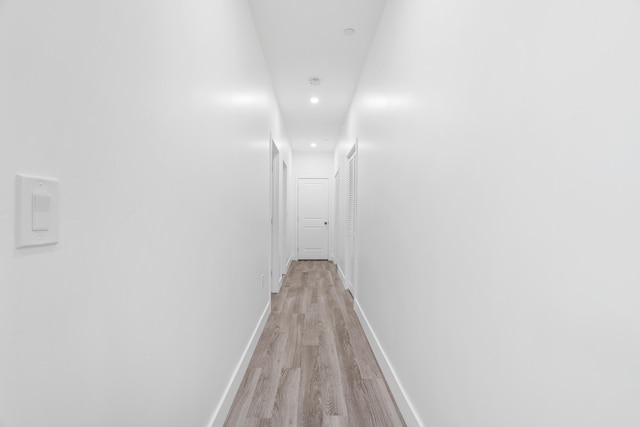 hallway featuring light hardwood / wood-style floors