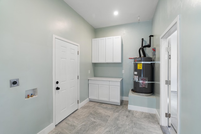 washroom featuring cabinets, hookup for a washing machine, water heater, and electric dryer hookup