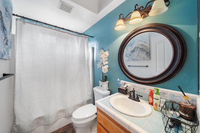 full bathroom with vanity, toilet, and shower / bathtub combination with curtain