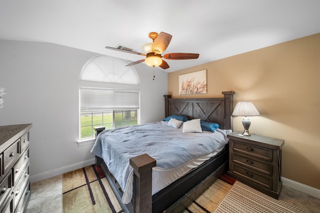 bedroom with ceiling fan and lofted ceiling