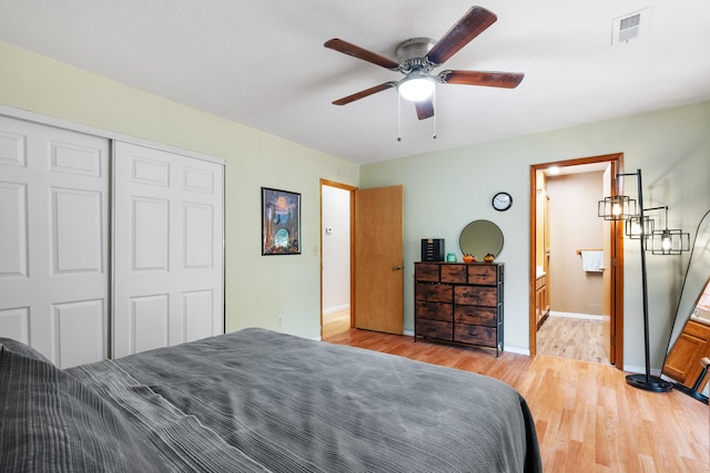 bedroom featuring a closet, ceiling fan, and light hardwood / wood-style flooring