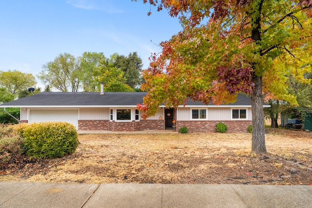 single story home with a garage