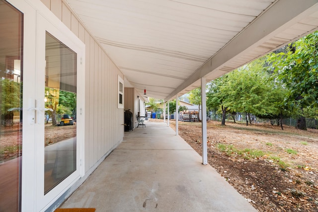 view of patio featuring a carport