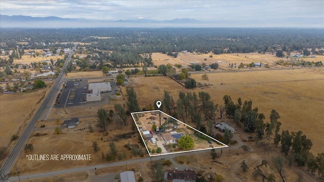 aerial view featuring a mountain view and a rural view