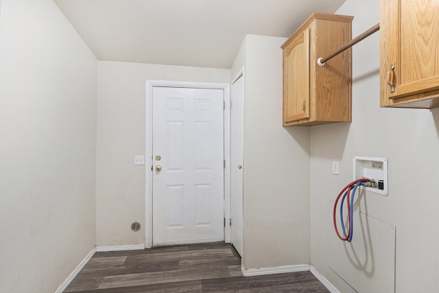 laundry area featuring hookup for a washing machine, dark hardwood / wood-style floors, and cabinets