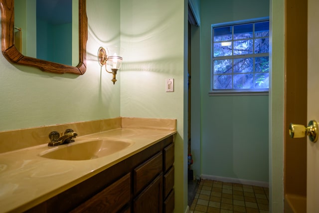 bathroom with vanity and tile patterned floors