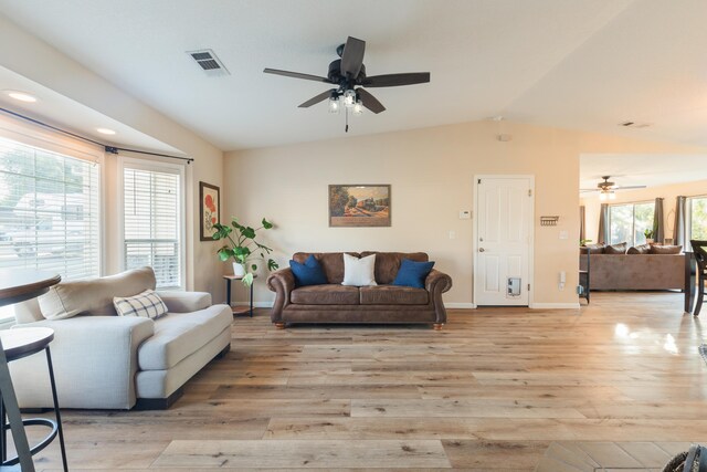 3182 Island Dr, Redding, CA 96001 - living room featuring ceiling fan, vaulted ceiling, light wood-style flooring, and recessed lighting