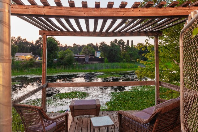 3182 Island Dr, Redding, CA 96001 - view of patio with a pergola and a water view