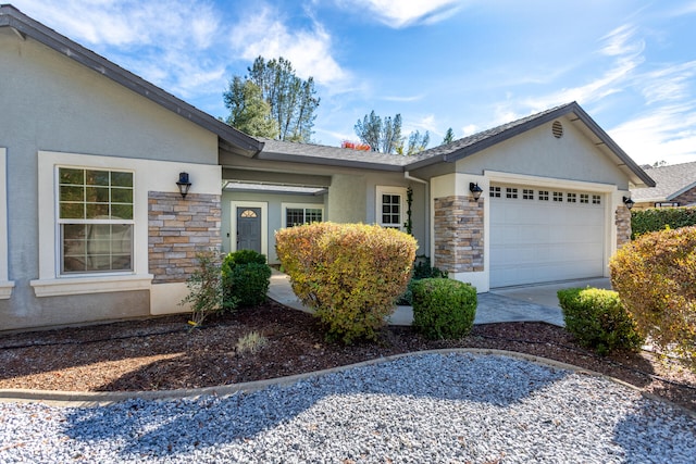 single story home with a garage