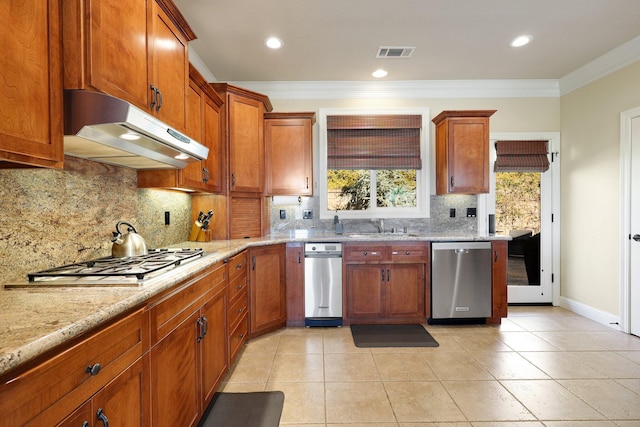 kitchen with crown molding, decorative backsplash, light stone countertops, light tile patterned floors, and appliances with stainless steel finishes