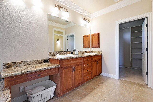 bathroom featuring crown molding, tile patterned flooring, and vanity