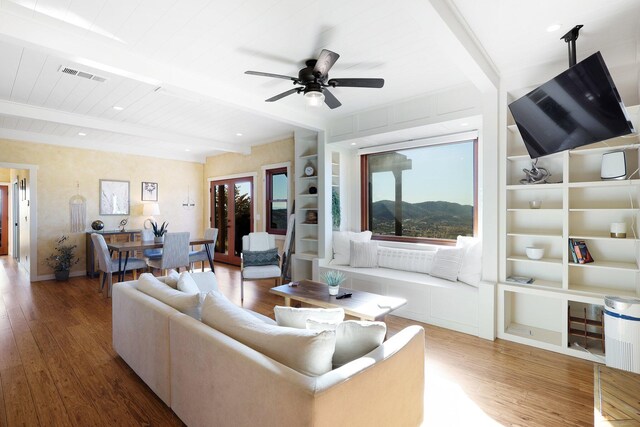 living room with beamed ceiling, ceiling fan, wooden ceiling, and dark wood-type flooring