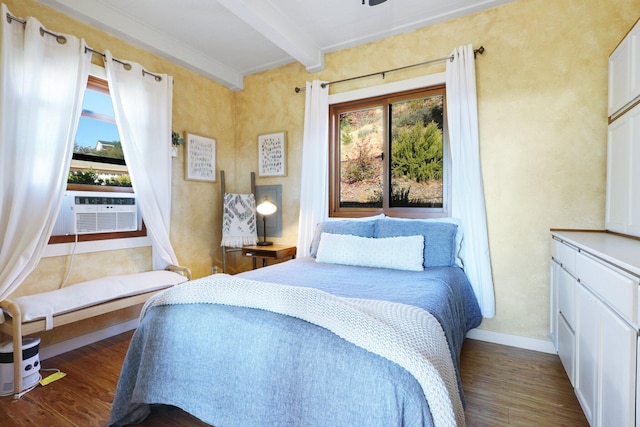 bedroom featuring beam ceiling and dark wood-type flooring