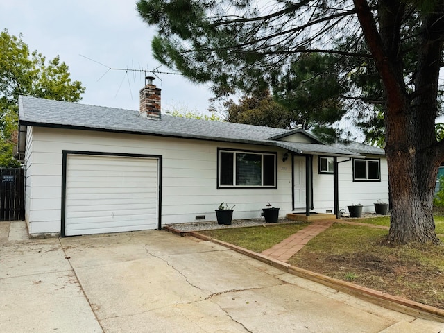 ranch-style home with a garage