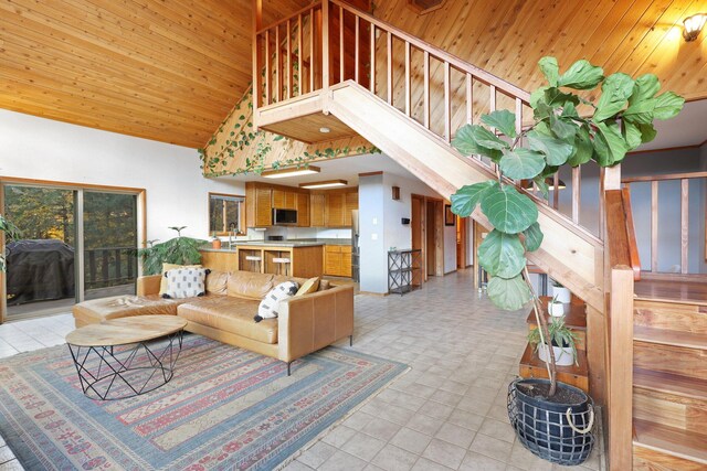 living room with wooden ceiling, sink, and high vaulted ceiling