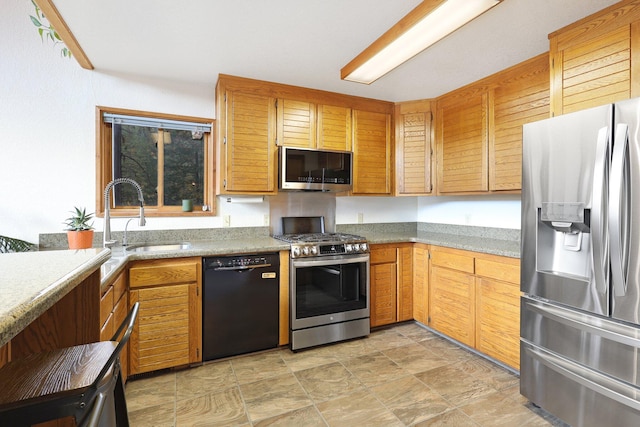 kitchen with sink and stainless steel appliances