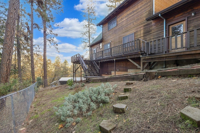 view of yard featuring a wooden deck