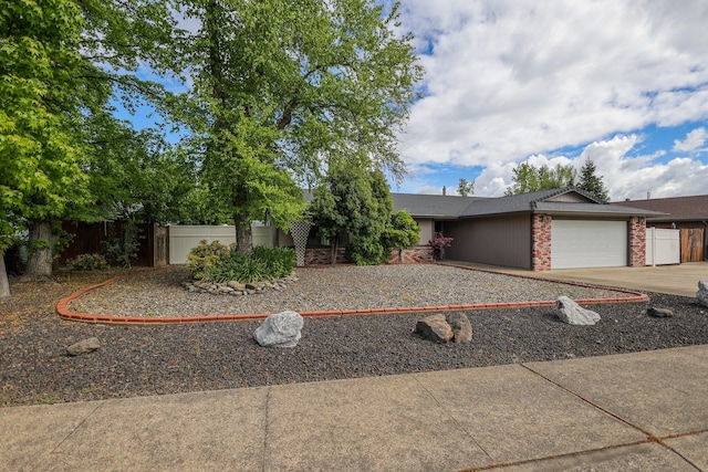 ranch-style home featuring a garage