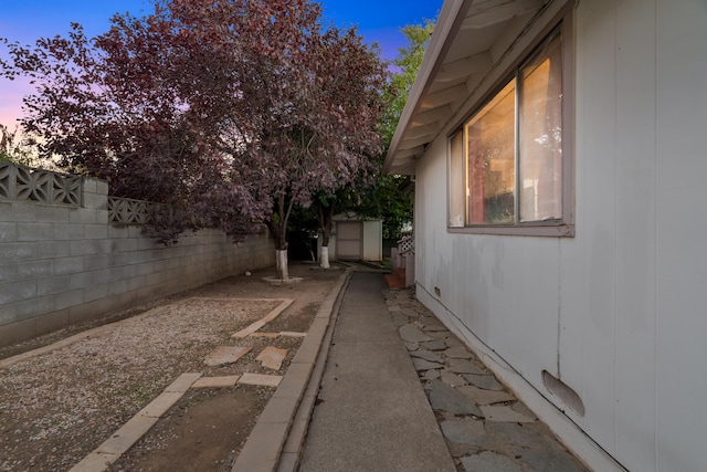 view of property exterior at dusk