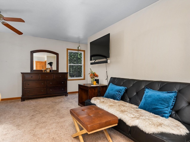 living room with light colored carpet and ceiling fan