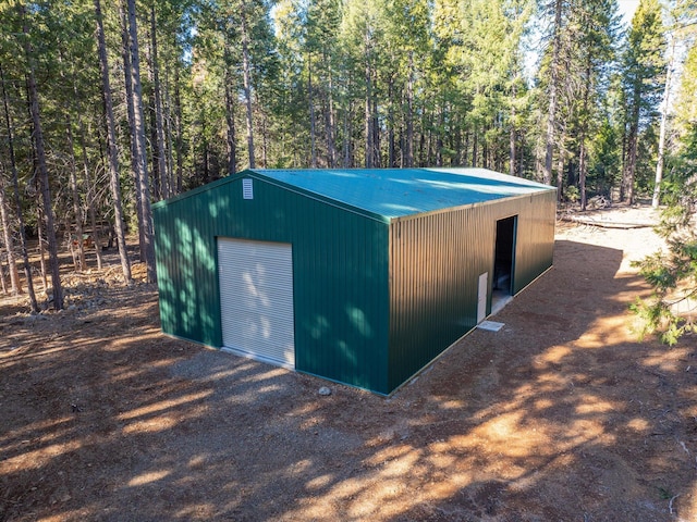 view of outbuilding with a garage