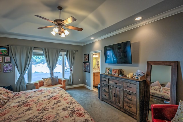 carpeted bedroom featuring crown molding, ceiling fan, and ensuite bathroom