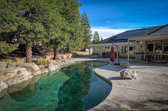 view of pool with a patio area