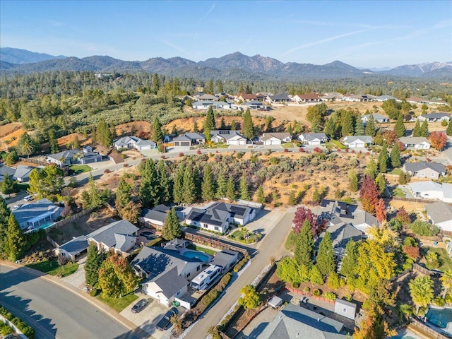 drone / aerial view featuring a mountain view