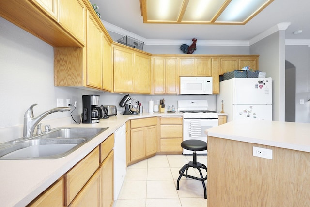 kitchen featuring light brown cabinetry, white appliances, crown molding, sink, and light tile patterned flooring