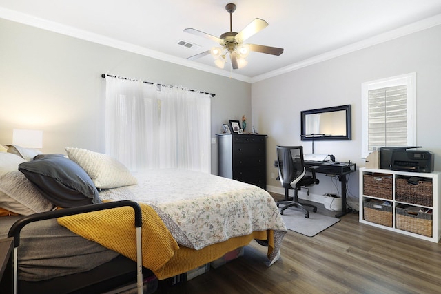 bedroom with ceiling fan, dark hardwood / wood-style flooring, and ornamental molding