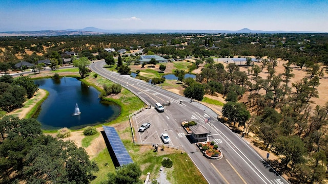 bird's eye view featuring a water and mountain view