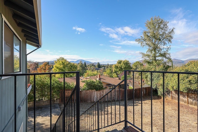 balcony featuring a mountain view