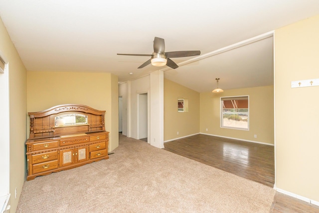1260 E Weaver Creek Rd, Weaverville, CA 96093 - unfurnished bedroom with lofted ceiling, wood finished floors, baseboards, ceiling fan, and carpet flooring