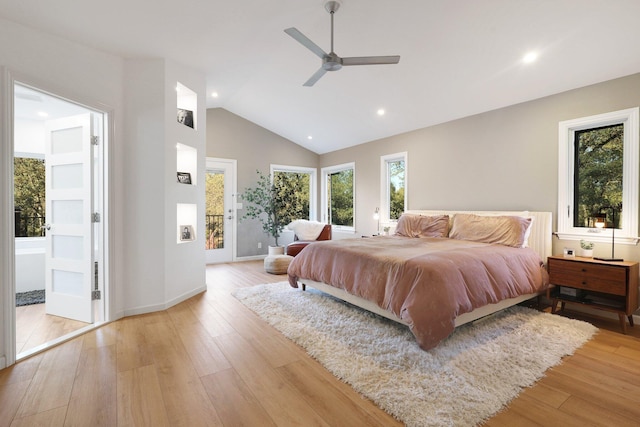 bedroom with ceiling fan, light hardwood / wood-style flooring, and multiple windows