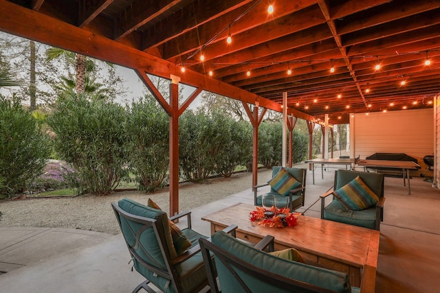 view of patio terrace at dusk