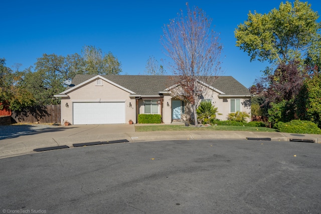 ranch-style home featuring a garage