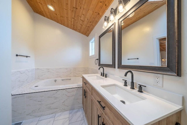 bathroom with a relaxing tiled tub, lofted ceiling, vanity, and wooden ceiling