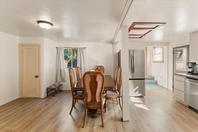 dining room featuring light hardwood / wood-style floors