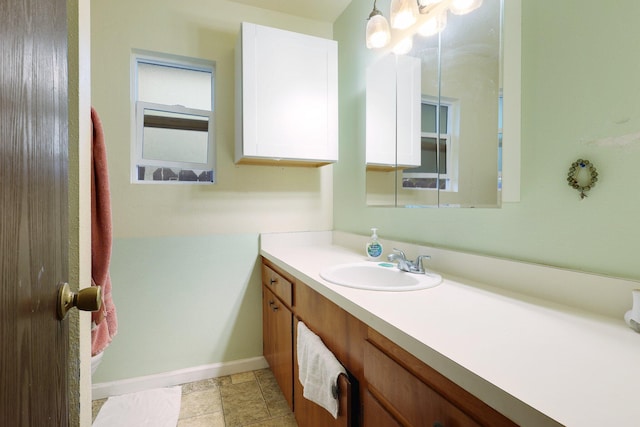 1535 Cordova St, Anderson, CA 96007 - bathroom featuring vanity and baseboards