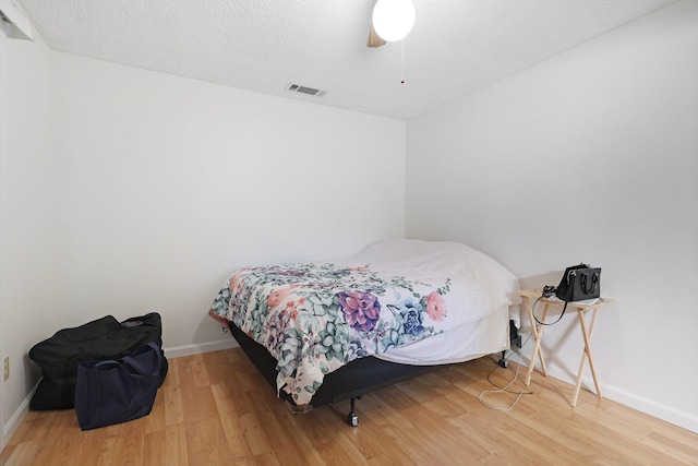 1535 Cordova St, Anderson, CA 96007 - bedroom with wood finished floors and a ceiling fan