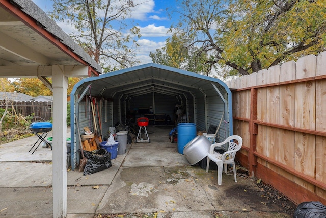 view of vehicle parking featuring a carport