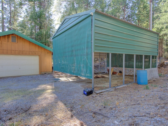 view of outbuilding featuring a garage