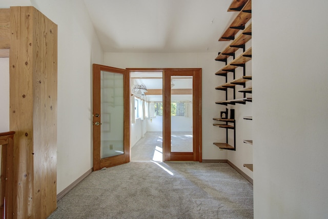 entryway with light carpet