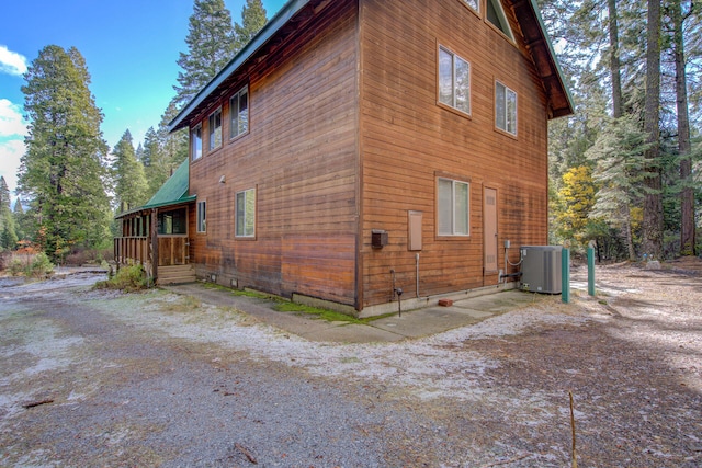 view of side of property featuring cooling unit