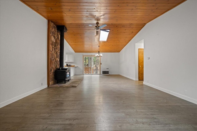 unfurnished living room with wooden ceiling, a wood stove, ceiling fan with notable chandelier, vaulted ceiling, and wood-type flooring