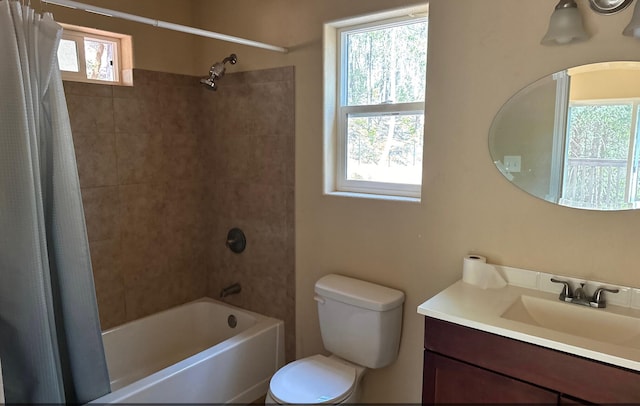 full bathroom with vanity, toilet, and shower / bath combo with shower curtain